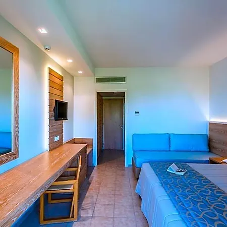 Отель Tigaki Beach Hotel Тигаки
