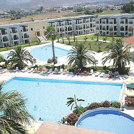 Отель Tigaki Beach Hotel Тигаки